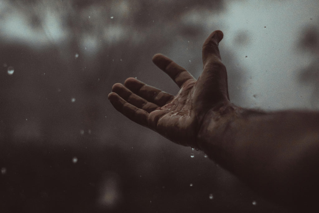 hands-in-rain